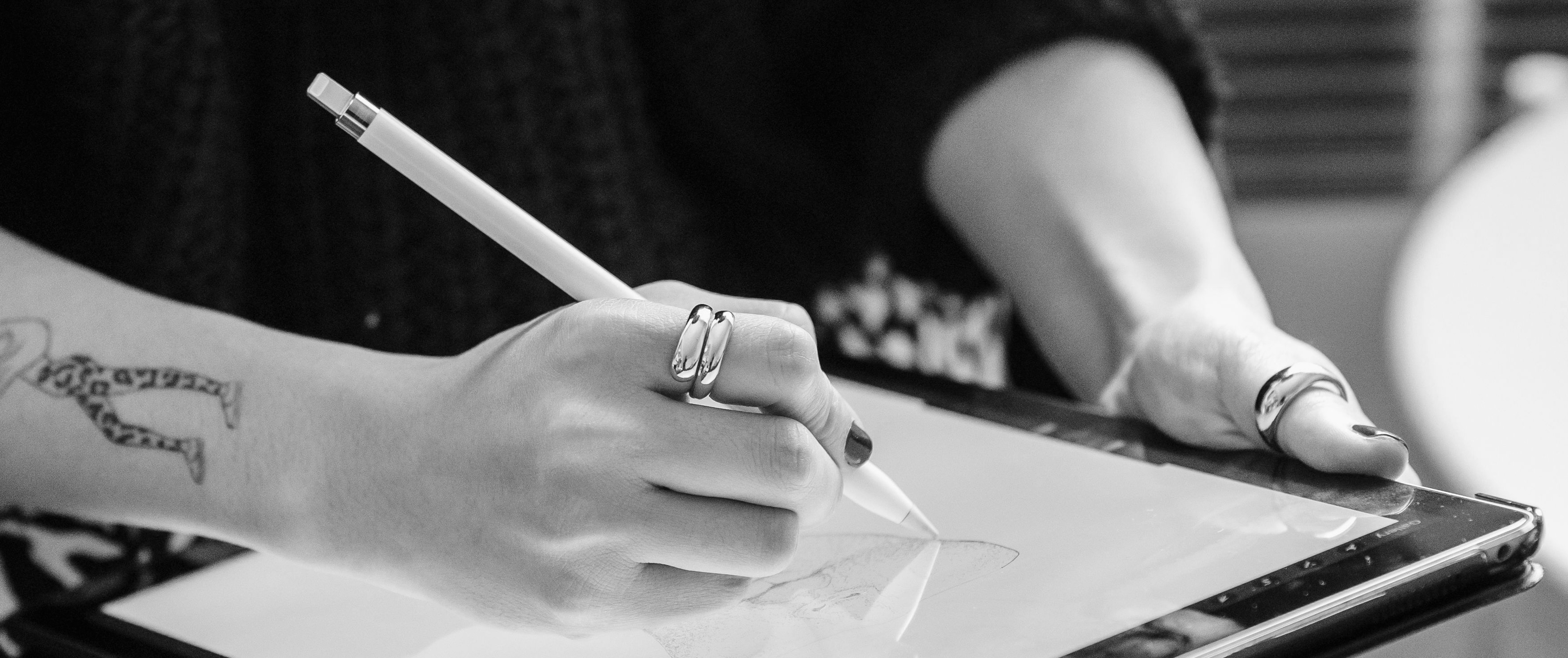 Designer sketching on a tablet